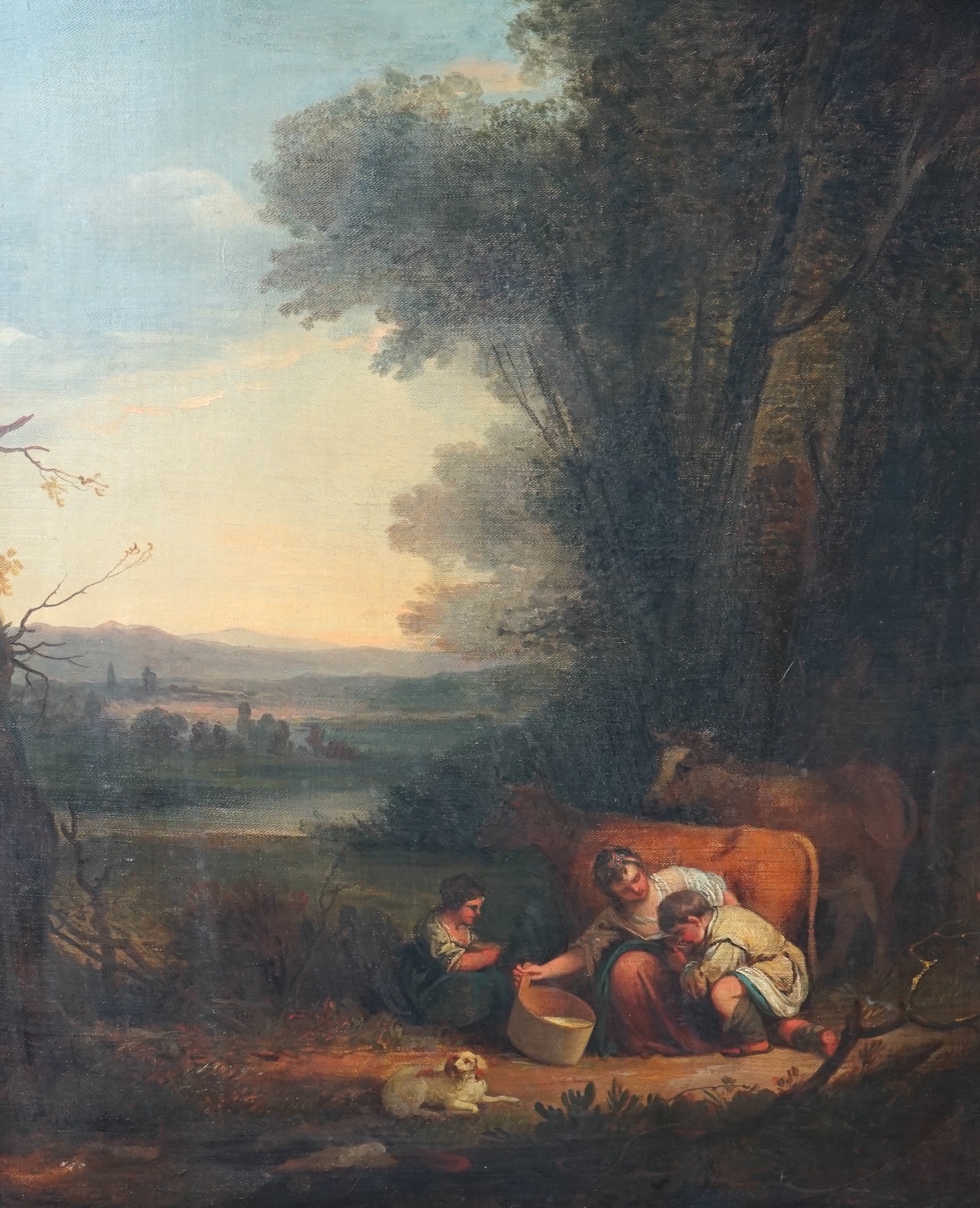 Attributed to Thomas Barker of Bath (British, 1769-1847), oil on canvas, Landscape with figures milking a cow, 75 x 61.5cm. Condition - fair to good, losses to frame